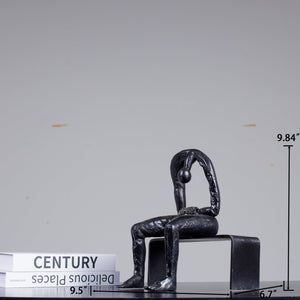 Albert György melancholy man bronze sculpture black finish side profile view