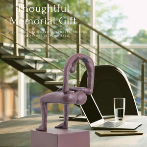 Albert György melancholy man bronze sculpture comfort through art plants interior display