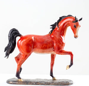 Arabian horse bronze sculpture front view showing detailed mane and stallion pose on black base