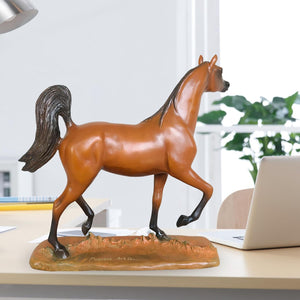 Arabian stallion bronze sculpture warm earth golden-brown finish left side view on terrain base
