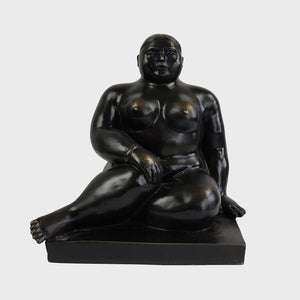Botero style bronze seated woman statue full view midnight black finish