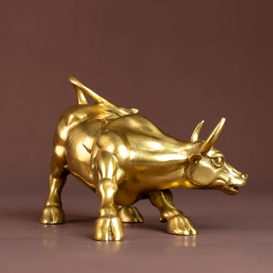 Detailed view of the brass Wall Street bull's muscle and form.