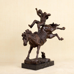 Standing view of large Bronco Buster bronze cowboy statue showing full figure height and proportions