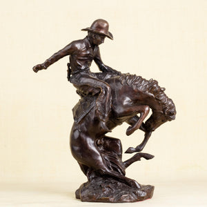 Rear right view of Style 3 Bronco Buster bronze cowboy horse statue
