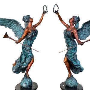 Bronze angel statue verdigris patina trumpet front view full body