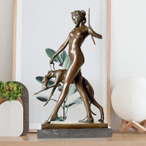 Bronze Artemis goddess figurine displayed as home office desk decor in study room setting