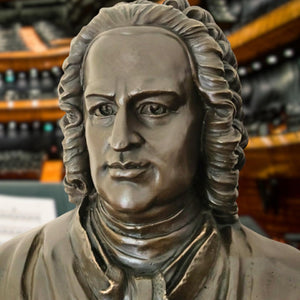 Bronze Bach bust statue angle view displayed near window in lifestyle setting