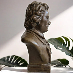 Second view of bronze Beethoven bust statue displayed with indoor plant decor