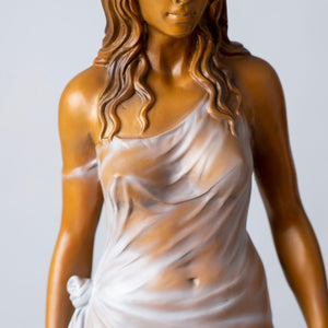 Bronze long haired graceful lady statue flowing dress fabric drape close up detail