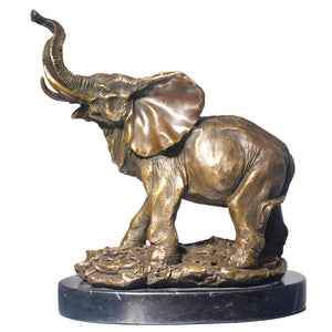 Bronze elephant statue side full body view on white background showing trunk up pose and marble base