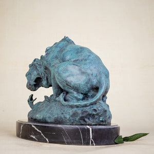 Dark bronze patina lion and serpent sculpture after Barye on marble base, side view beige background