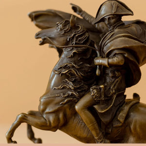 Front angle view of bronze Napoleon Crossing the Alps statue showing rider and rearing horse detail
