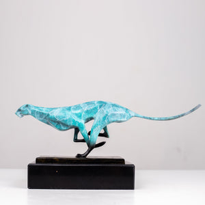 Teal azure running cheetah sculpture on black marble base side view display