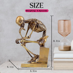 Bronze skeleton Thinker statue in gold finish size chart showing height and base width dimensions