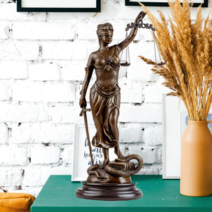 Full body side view of bronze Themis Lady Justice statue in professional office interior setting