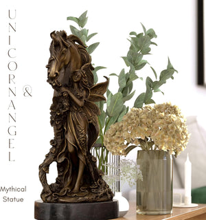 Bronze unicorn angel sculpture displayed alongside indoor plants as home décor accent