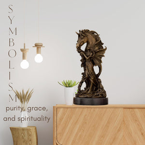 Bronze unicorn angel sculpture displayed with text about symbolism and spirituality