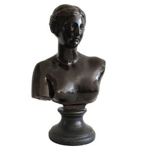 Bronze Venus de Milo bust statue front view on white background showing classical sculpture detail