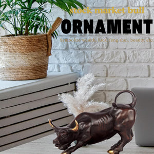 Rich brown texture with gold-polished hoof details on brass bull figurine.