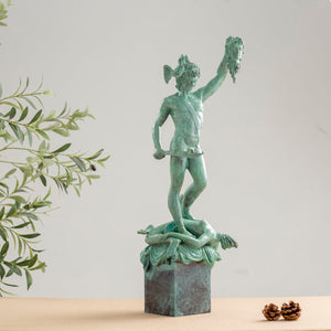 Cellini Perseus Medusa green bronze statue size reference in indoor setting with lamp