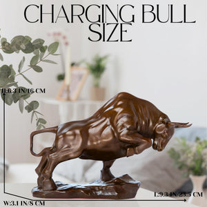 Bronze charging bull sculpture, side profile display.