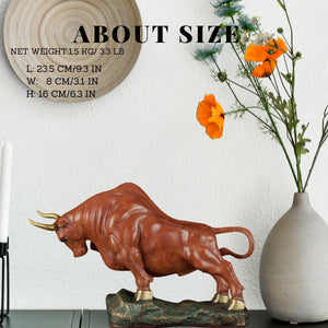 9.5 in -orange-red charging bull statue size reference.