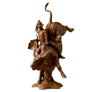 Side view profile of red-brown solid bronze cowboy rodeo action sculpture