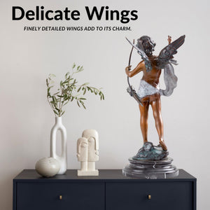 Cupid bronze sculpture delicate wings display beside vase bright interior