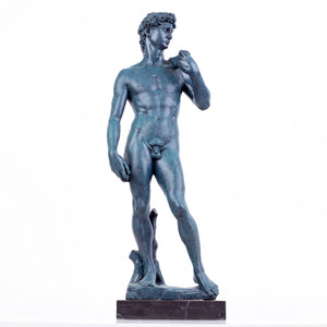 David modern sculpture in matte black finish, front view on marble base