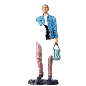 Modern bronze traveler sculpture with blue denim jacket and missing body parts on white background.