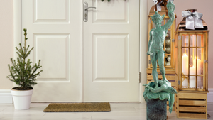 Cellini Perseus Medusa verdigris bronze sculpture styled in elegant home interior setting
