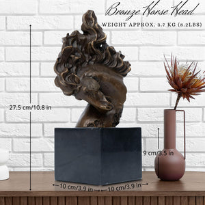 "Flames of Spirit" bronze horse head sculpture displayed against brick wall bookshelf with vase decor
