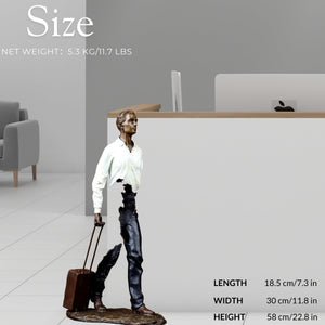 Side view of the fragmented traveler bronze statue highlighting the surrealist hollow design.