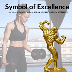 Gilded gold bodybuilder bronze sculpture as symbol of excellence displayed with fitness athlete