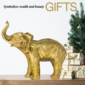 Golden brass elephant statue on office desk as symbol of strength and wealth decor