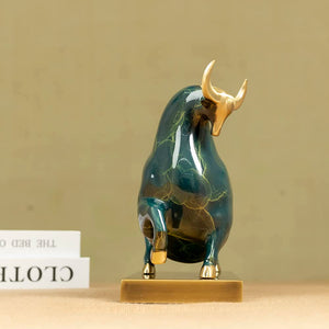 Solid brass base detail of the luxury green enamel bull.