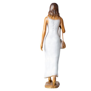 Luo Li Rong bronze elegant woman with handbag statue back view white dress detail