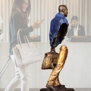 Large 60cm voyageur bronze statue displayed as a luxury home gallery center piece.
