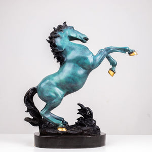 Azure blue bronze rearing stallion sculpture angle view showing gold hoof accent and dynamic pose