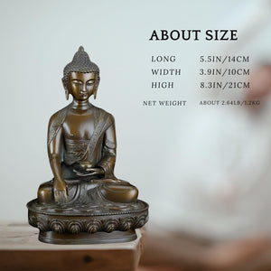 Medicine Buddha bronze statue right side view on light background displaying full sculptural profile