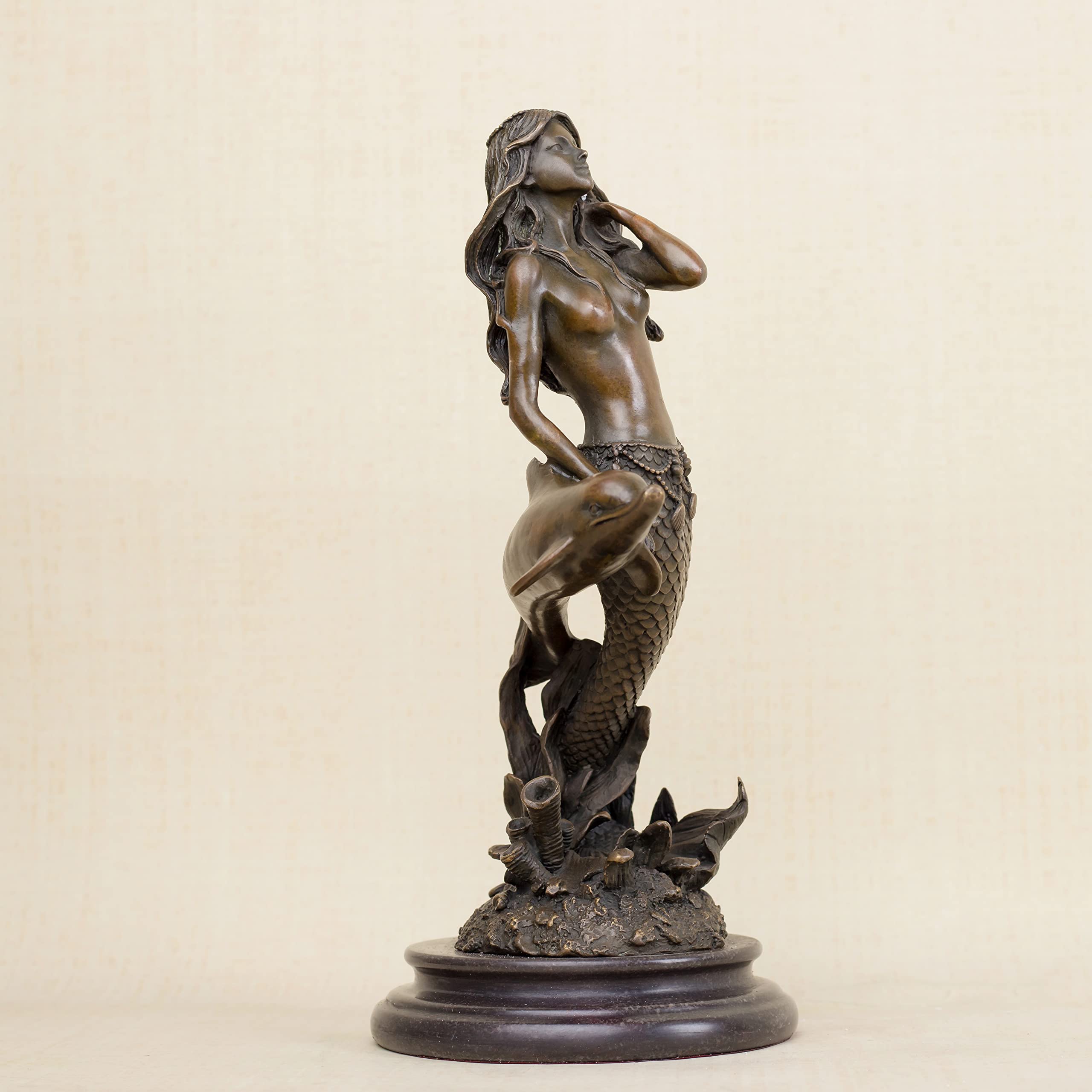 Mermaid and dolphin bronze sculpture front view dark patina natural marble base