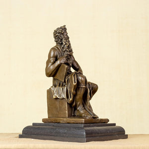 Moses bronze replica statue left side angle showing sculpted details and dark stone base