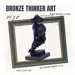 Black Silence is Gold thinker bronze sculpture styled in modern home and office interior