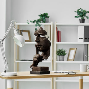 Black Silence is Gold thinker bronze figurine displayed on office bookshelf décor