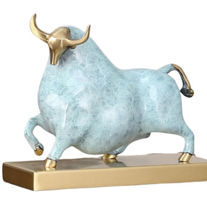 Side profile of the abstract sky blue charging bull figurine.