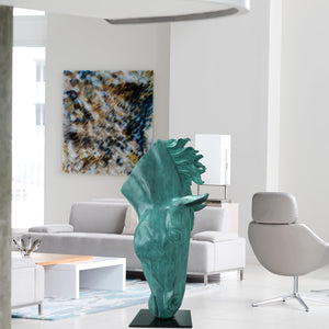 Still Water horse head bronze sculpture emerald patina displayed in modern living room beside wall art