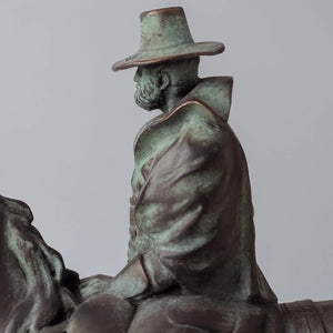 Base detail of Ulysses S. Grant bronze equestrian statue showing inscription plate and rectangular bronze base