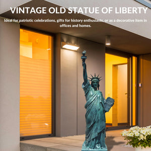Vintage style verdigris blue bronze Statue of Liberty displayed at luxury home entrance doorway