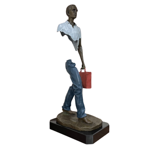 Detailed view of the vibrant red bag accessory on the greyish white bronze traveler