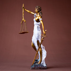 White finish Lady Justice Themis statue front full body view on warm brown background